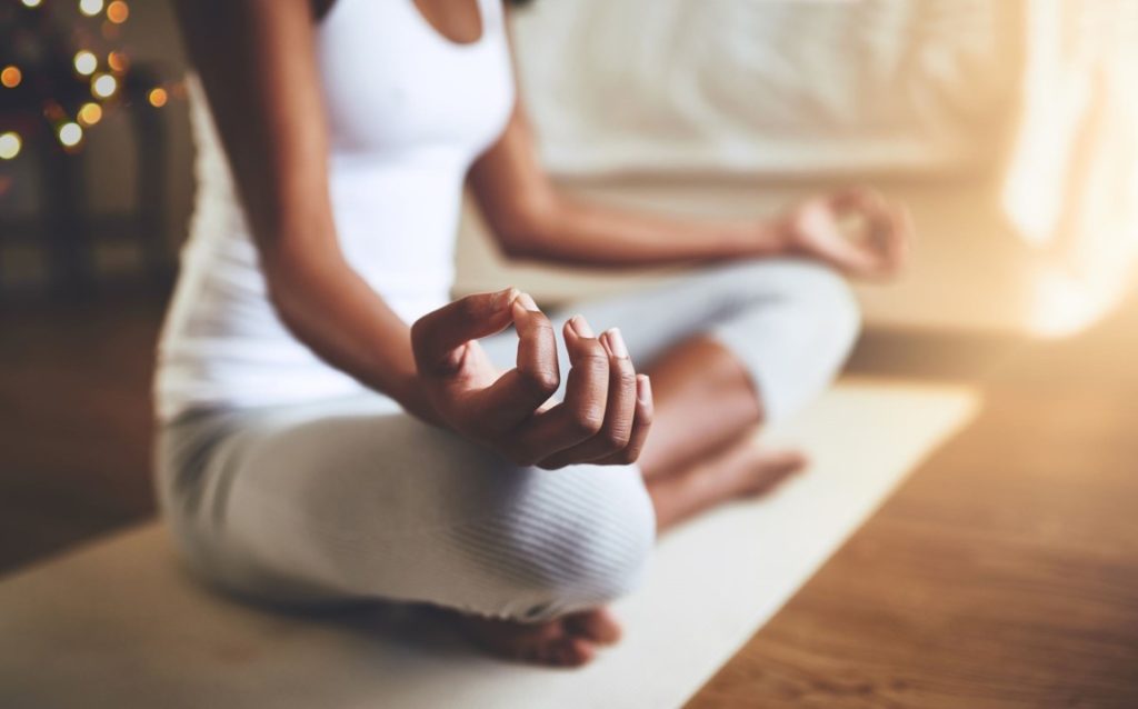 Woman in seated yoga pose