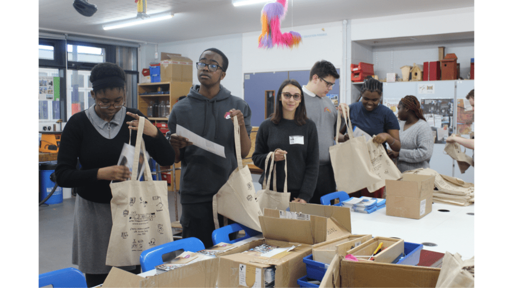 Charlton Park Academy students packing the visitor showbags for Communication Works