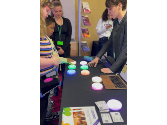 Students using Cosmo switches in the exhibition hall