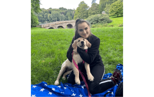 Ellise Hayward with her puppy.