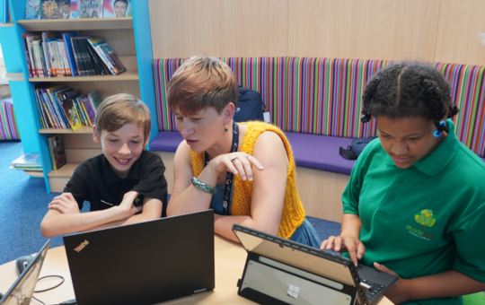 CENMAC Advisory Teacher Carly Adkinson supporting Middle Park Primary pupils with their assistive technology CENMAC Advisory Teacher Carly Adkinson supporting Middle Park Primary pupils with their assistive technology