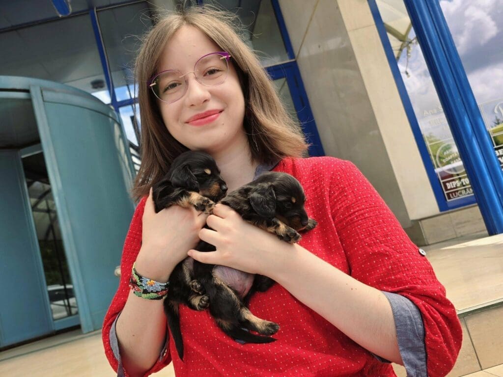 Teia with her puppies