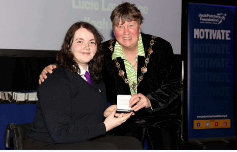Phoebe receiving her Jack Petchey award