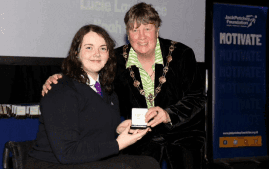 Phoebe receiving her award Phoebe receiving her award