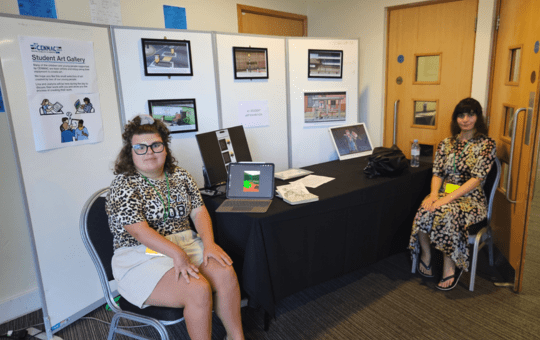 Student Artists with their artworks Student Artists with their artworks
